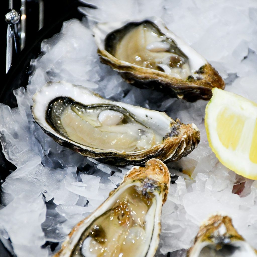 Oyster on black ceramic plate